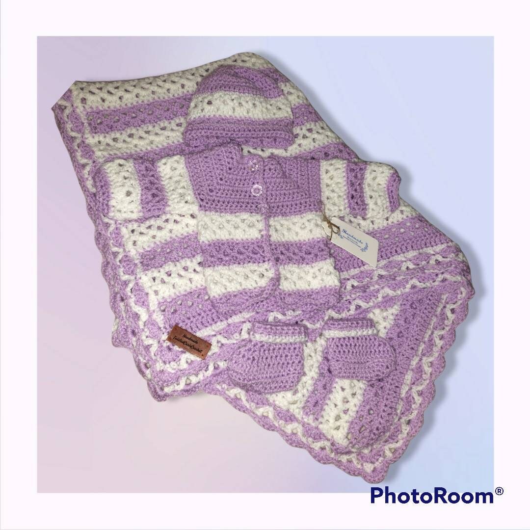Handmade baby girl newborn set with blanket, hat, cardigan, and booties